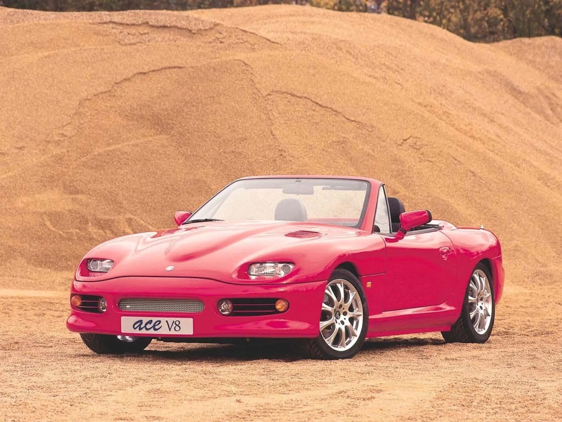 roadster met supercharged V8