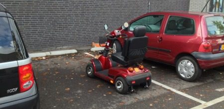 Scootmobielhufterigheid van de bovenste plank